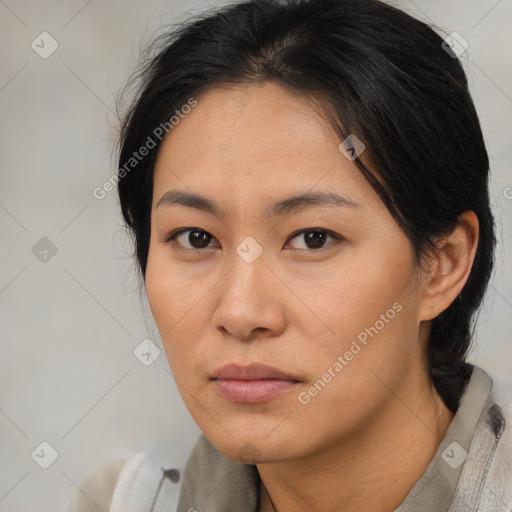 Neutral asian young-adult female with medium  brown hair and brown eyes