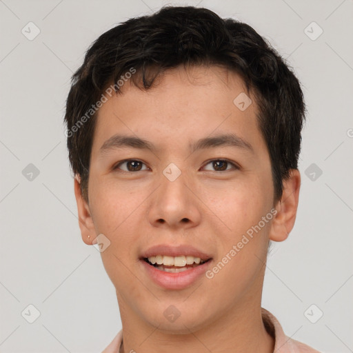 Joyful asian young-adult male with short  brown hair and brown eyes