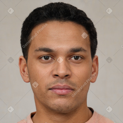 Neutral latino young-adult male with short  black hair and brown eyes