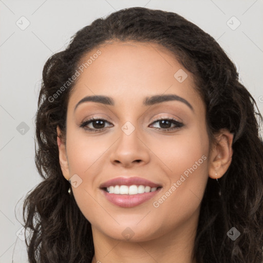 Joyful latino young-adult female with long  brown hair and brown eyes