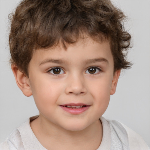 Joyful white child male with short  brown hair and brown eyes