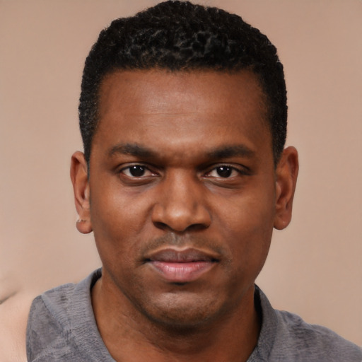 Neutral black young-adult male with short  black hair and brown eyes