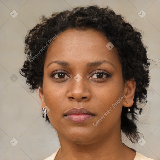 Neutral black young-adult female with short  brown hair and brown eyes