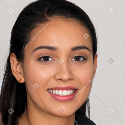 Joyful latino young-adult female with long  brown hair and brown eyes