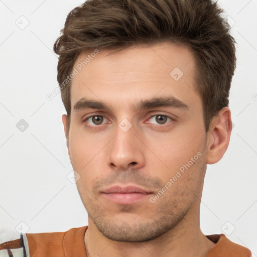 Neutral white young-adult male with short  brown hair and brown eyes