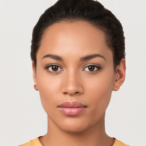 Neutral latino young-adult female with short  brown hair and brown eyes