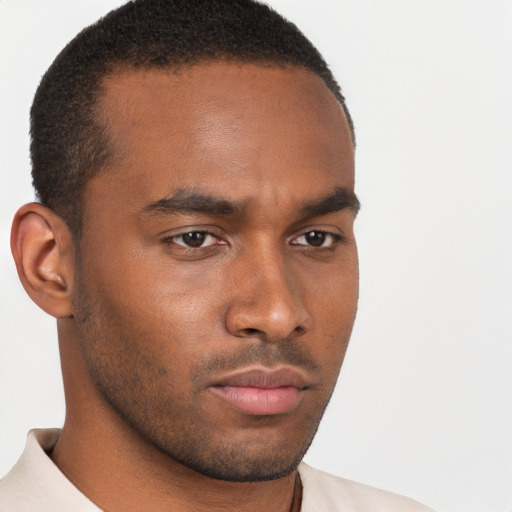 Neutral black young-adult male with short  brown hair and brown eyes