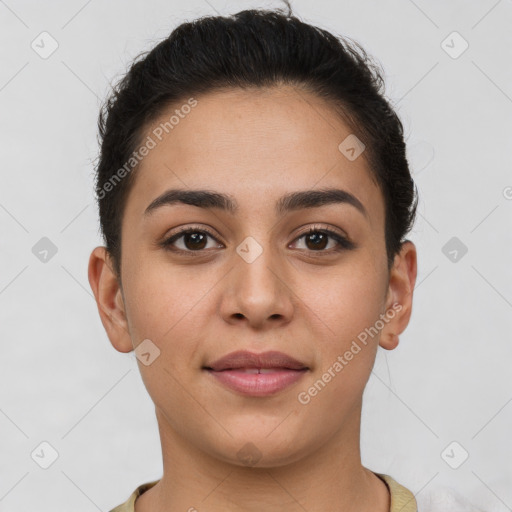 Joyful white young-adult female with short  brown hair and brown eyes