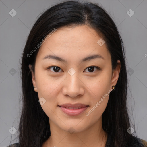 Joyful asian young-adult female with long  brown hair and brown eyes