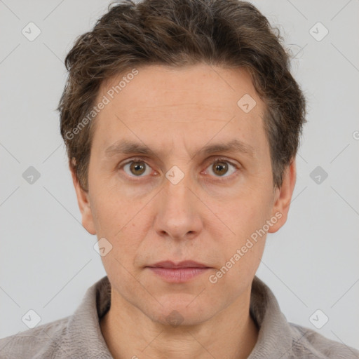 Neutral white adult male with short  brown hair and grey eyes