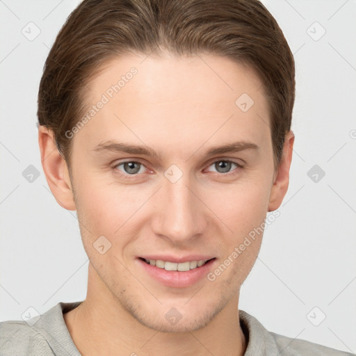 Joyful white young-adult female with short  brown hair and grey eyes