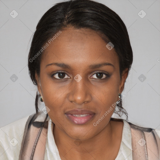 Joyful black young-adult female with short  brown hair and brown eyes