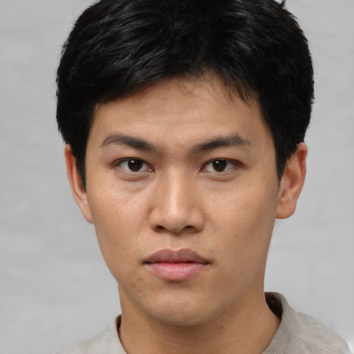 Neutral asian young-adult male with short  black hair and brown eyes