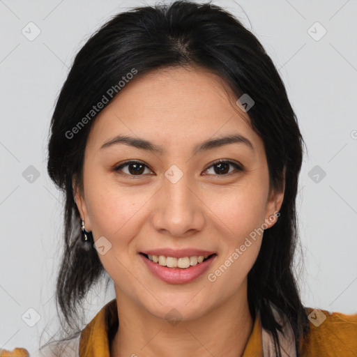 Joyful latino young-adult female with medium  brown hair and brown eyes