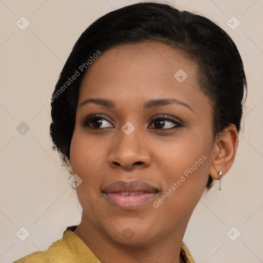 Joyful latino young-adult female with short  black hair and brown eyes