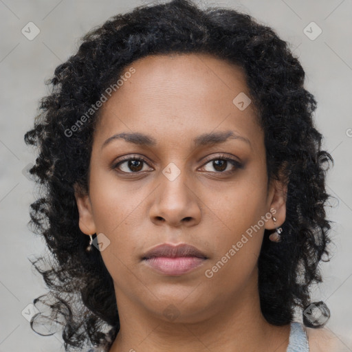 Neutral black young-adult female with long  brown hair and brown eyes