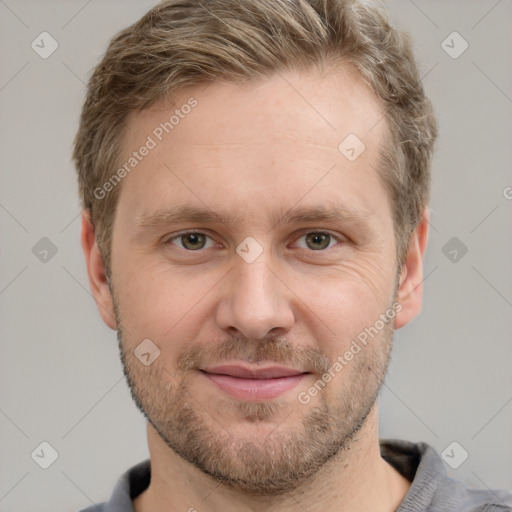 Joyful white adult male with short  brown hair and grey eyes