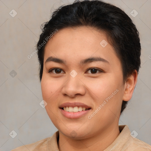 Joyful asian young-adult female with short  brown hair and brown eyes