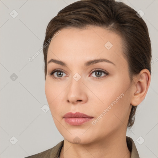 Neutral white young-adult female with medium  brown hair and brown eyes