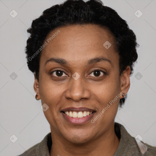 Joyful latino adult female with short  black hair and brown eyes