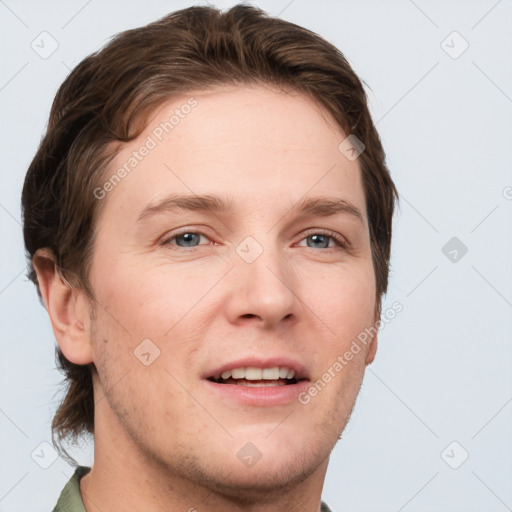 Joyful white adult male with short  brown hair and grey eyes