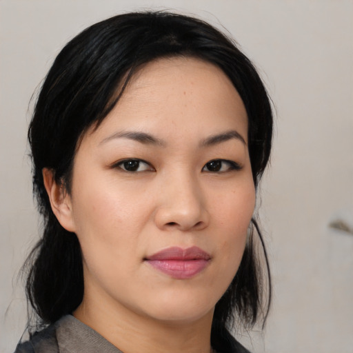 Neutral asian young-adult female with medium  black hair and brown eyes