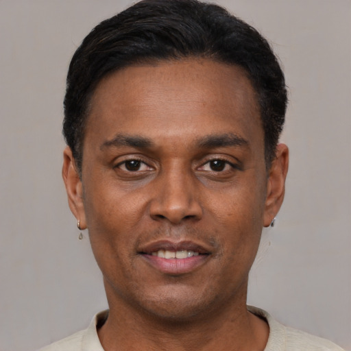 Neutral black young-adult male with short  black hair and brown eyes