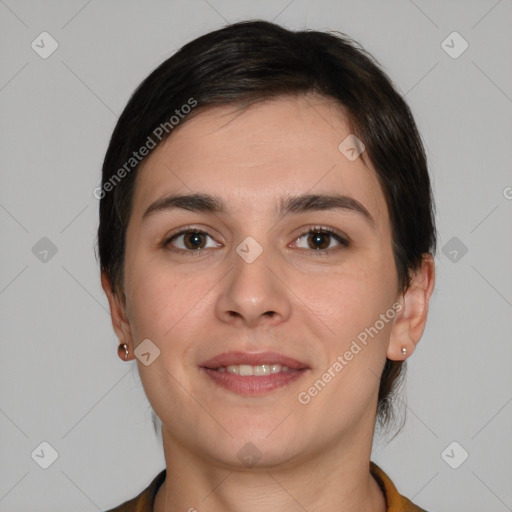 Joyful white young-adult female with short  brown hair and brown eyes