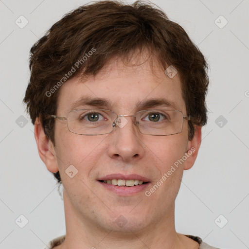 Joyful white adult male with short  brown hair and grey eyes