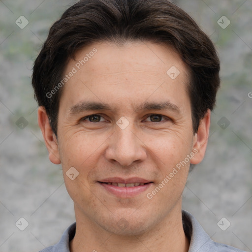 Joyful white adult male with short  brown hair and brown eyes