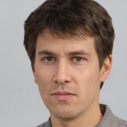 Neutral white adult male with short  brown hair and brown eyes