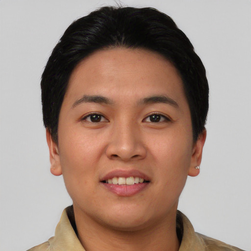 Joyful white young-adult female with short  black hair and brown eyes