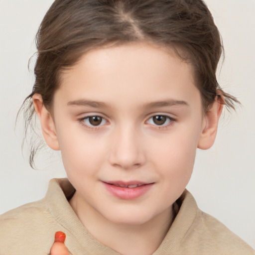 Joyful white child female with medium  brown hair and brown eyes