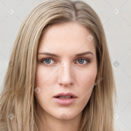 Neutral white young-adult female with long  brown hair and brown eyes