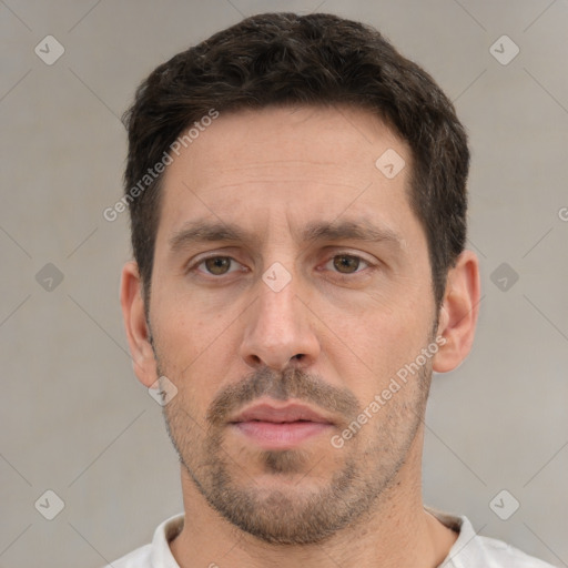 Neutral white adult male with short  brown hair and brown eyes