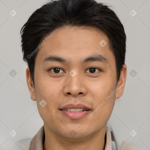 Joyful asian young-adult male with short  brown hair and brown eyes