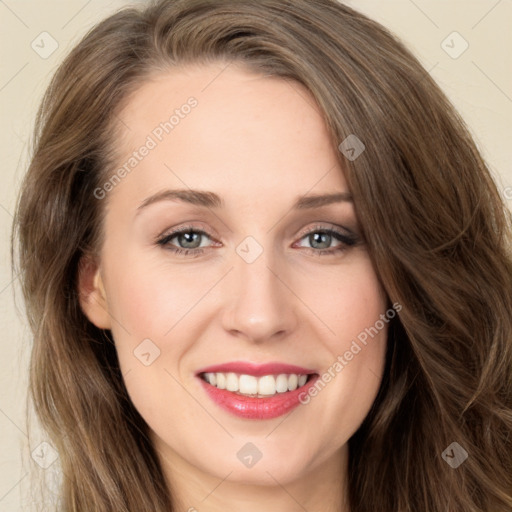 Joyful white young-adult female with long  brown hair and green eyes