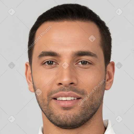 Joyful white young-adult male with short  brown hair and brown eyes