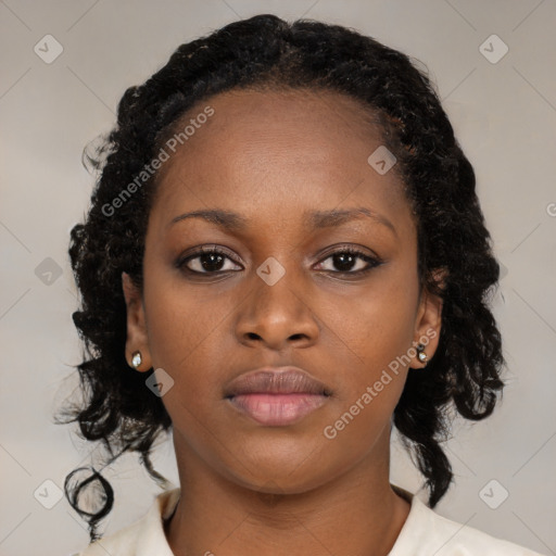 Neutral black young-adult female with medium  black hair and brown eyes