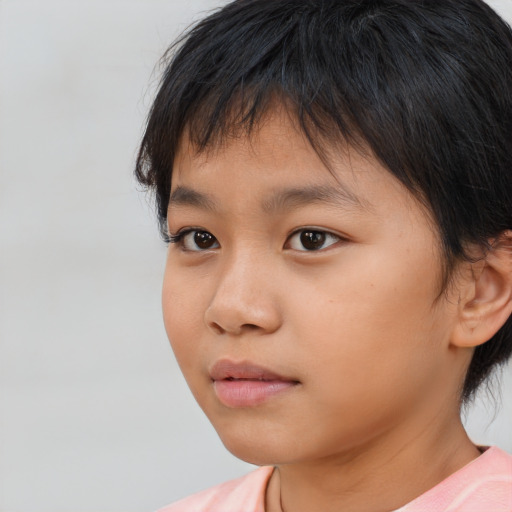Neutral asian child female with medium  brown hair and brown eyes