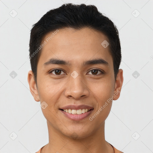 Joyful latino young-adult male with short  black hair and brown eyes