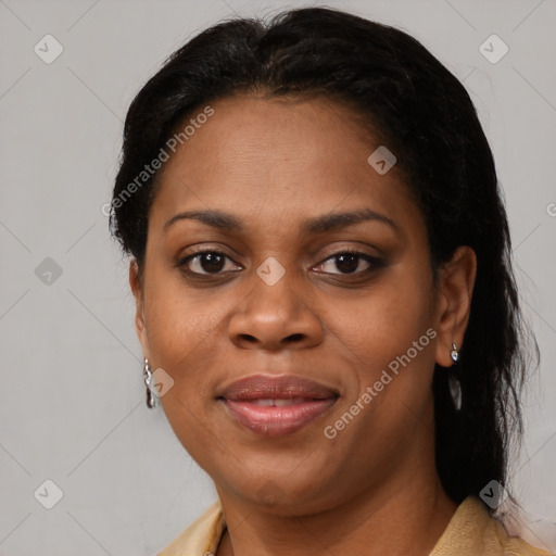 Joyful black adult female with medium  black hair and brown eyes