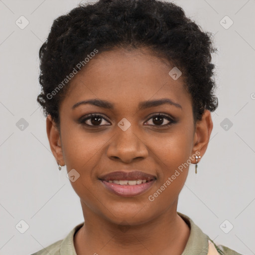 Joyful black young-adult female with short  brown hair and brown eyes