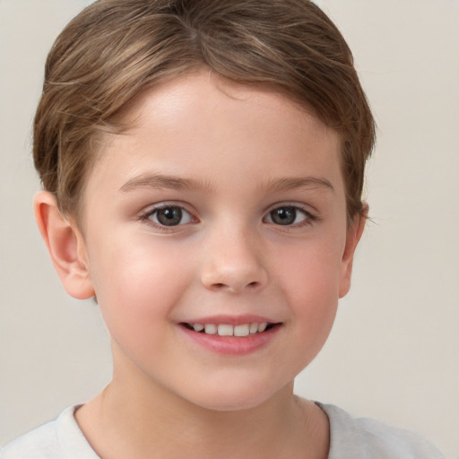 Joyful white child female with short  brown hair and brown eyes