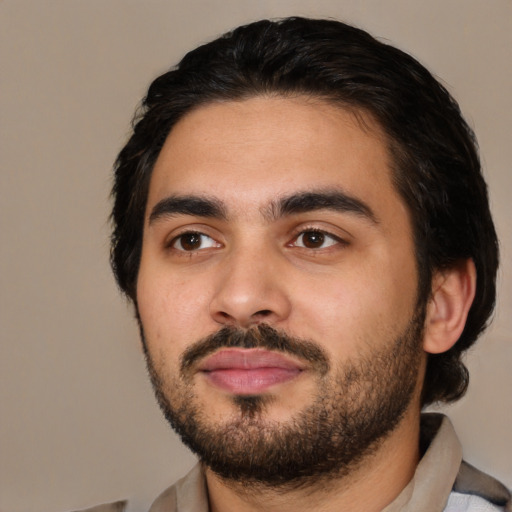 Neutral latino young-adult male with short  black hair and brown eyes
