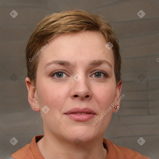 Joyful white young-adult female with short  brown hair and grey eyes