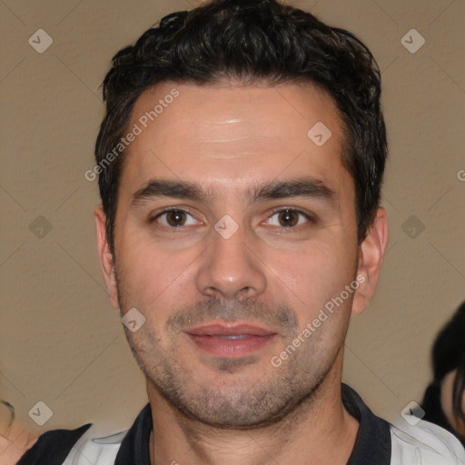 Joyful white adult male with short  brown hair and brown eyes