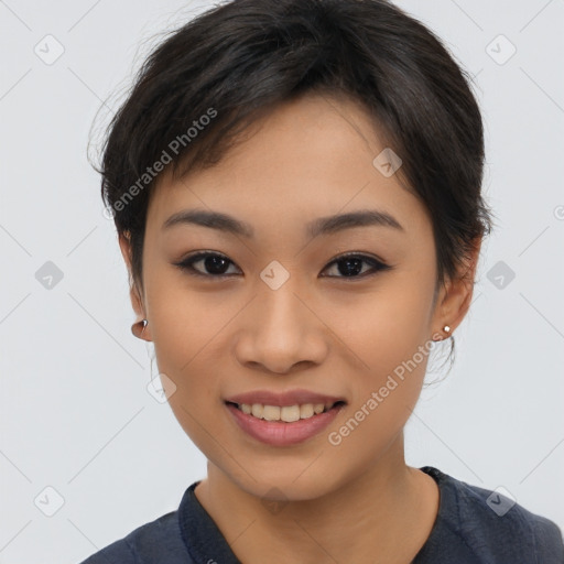 Joyful asian young-adult female with short  brown hair and brown eyes