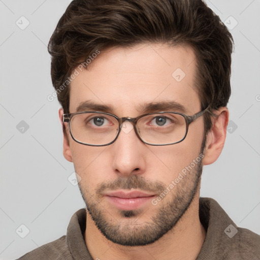 Neutral white young-adult male with short  brown hair and grey eyes