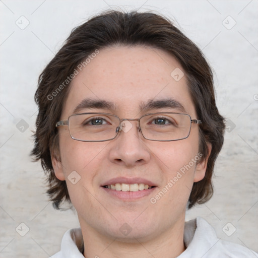 Joyful white adult male with medium  brown hair and brown eyes